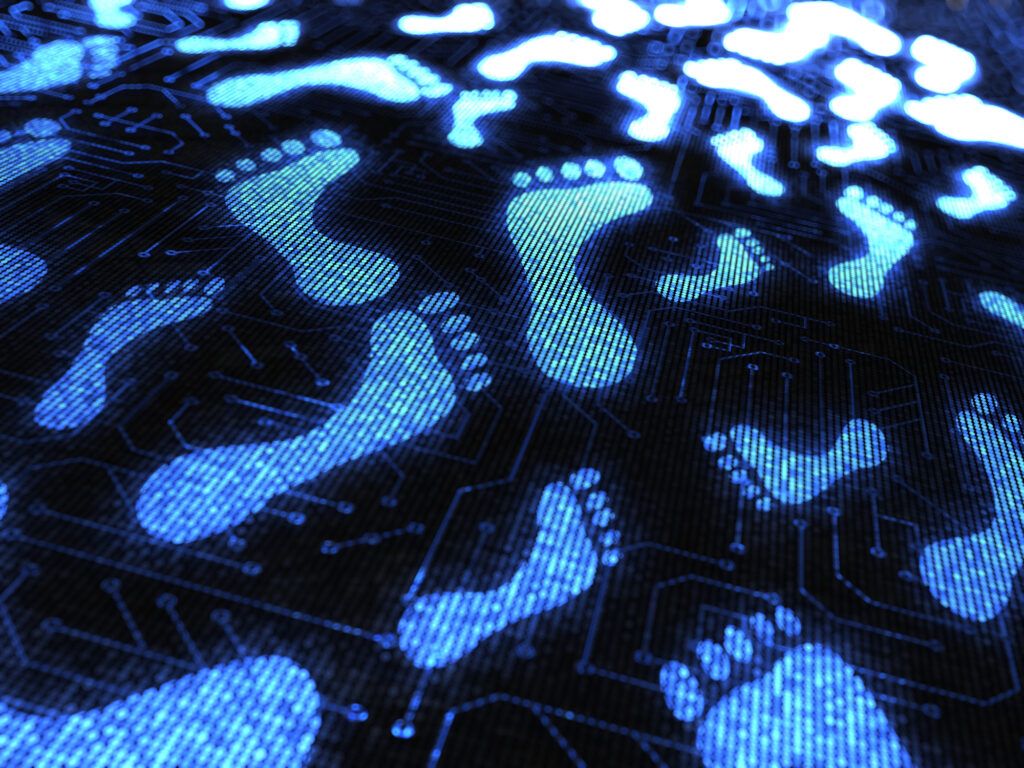 Blue footprints over a circuit board