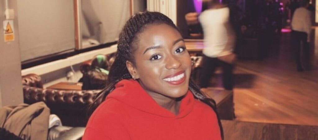 Unitemps candidate Christianah Babajide on campus at City University of London smiling