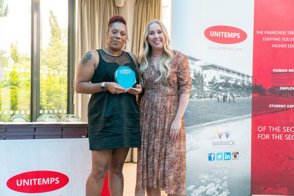 Unitemps staff member Michelle Coates receiving award
