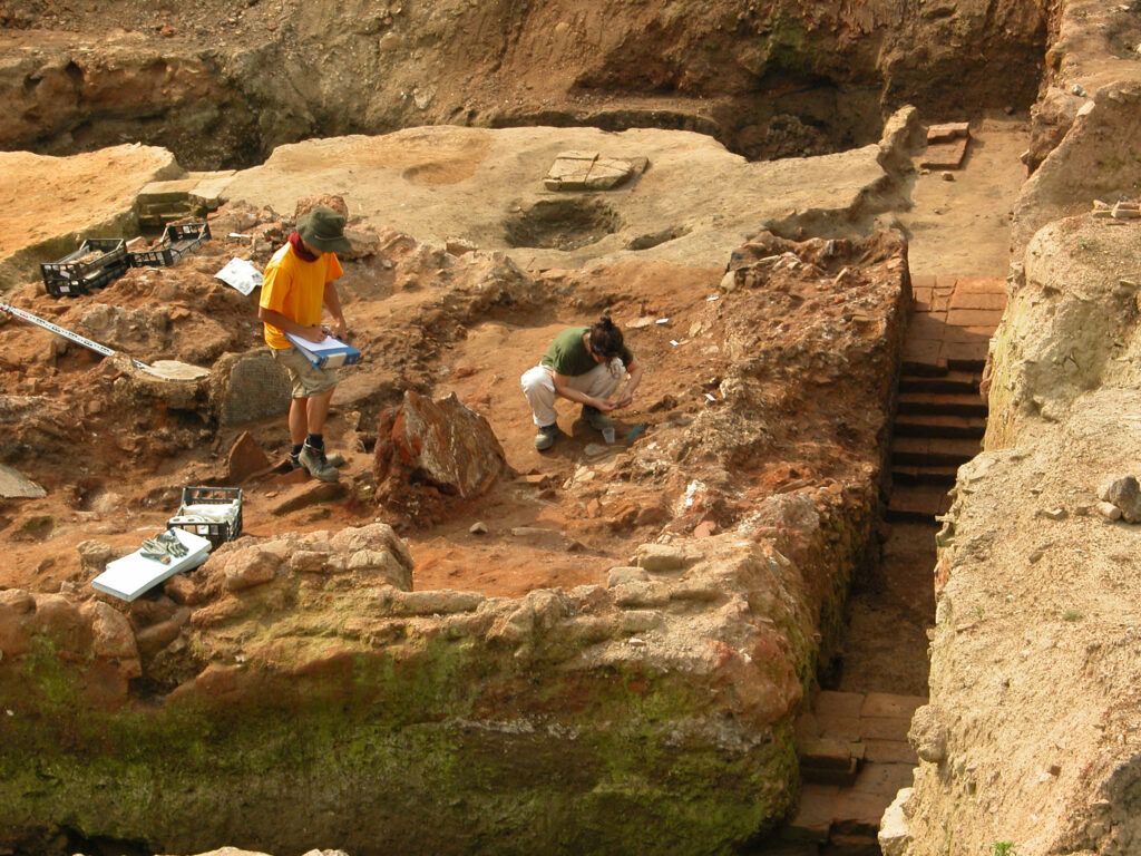 Archeologists looking through sand on an ancient site